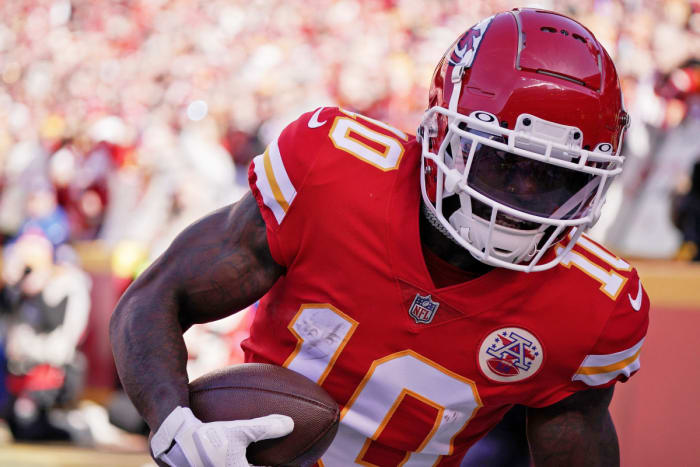 Jan 30, 2022; Kansas City, Missouri, USA; Kansas City Chiefs wide receiver Tyreek Hill (10) makes a catch for a touchdown against the Cincinnati Bengals during the first quarter of the AFC Championship Game at GEHA Field at Arrowhead Stadium. Mandatory Credit: Denny Medley-USA TODAY Sports